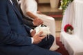 A detail shot of the best man holding wedding rings Royalty Free Stock Photo