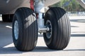 Detail shot with big airplane wheels and landing gear Royalty Free Stock Photo