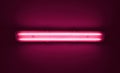 Detail shot of a fluorescent light tube on a wall.