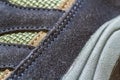 Detail shot of fragmrnt of new fashionable hiking mountain boot. Royalty Free Stock Photo
