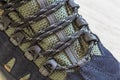 Detail shot of fragmrnt of new fashionable hiking mountain boot. Royalty Free Stock Photo