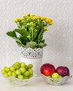 Detail shot of fruit bowls and a flower pot