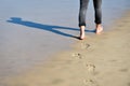 Man footprints in the sand on a beach Royalty Free Stock Photo