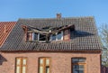 old house with a destroyed roof