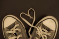 Retro sneakers heart shaped laces Royalty Free Stock Photo