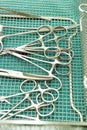 Detail shot of steralized surgery instruments with a hand grabbing a tool Royalty Free Stock Photo