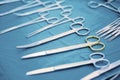 Detail shot of steralized surgery instruments with a hand grabbing a tool Royalty Free Stock Photo