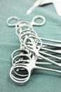 Detail shot of steralized surgery instruments with a hand grabbing a tool Royalty Free Stock Photo