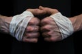 detail shot of a wing chun fighters hands wrapped in traditional bandages