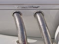 Side pipes exhaust sysyem of a classic Excalibur car