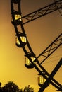 Silhouette ferris wheel against sky