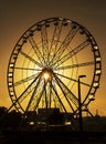 Silhouette ferris wheel against sky