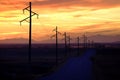 Sihouette Silhouetted Power Lines at Sunrise or Sunset