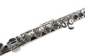 Detail of a Silver Flute on White Royalty Free Stock Photo