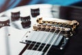 Detail of six-string electric guitar closeup, selective focus. Processed with vintage style Royalty Free Stock Photo