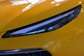 Detail of sleek elegant LED headlight of modern chinese compact crossover SUV car