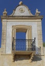 Detail of the small Doorway and iron railed Terrace high up on the walls of the Palace of Estoi.