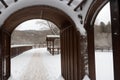 Detail of a snow-covered iron gate