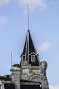 Detail spiers roof medieval castle with blue windows