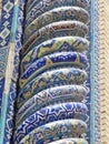 Spiral column of decorated ceramic of a religious building in Uzbekistan.