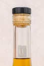 Detail of spirit bottle with cork. Close Up on cork inide bottle neck