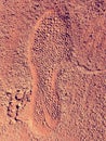 Detail with a sport shoe footprint on a tennis clay court Royalty Free Stock Photo