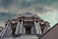 Detail of the St Peter`s Basilica in Vatican on a cloudy day