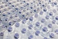 Detail of stack bottled water in industry Royalty Free Stock Photo