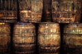 Detail of stacked old wooden whisky barrels Royalty Free Stock Photo