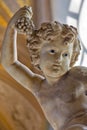 Detail of statue with child with originaly painted eyes in Vatican