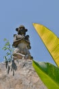 Detail of a statue of a Hindu deity.