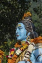 Detail of the statue of Shiva, hindu idol on the ghat near the Ganges river in Rishikesh, India Royalty Free Stock Photo