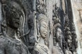 Detail of a Stone Carved Relief in the famous Angkor Wat in Cambodia and the largest religious monument in the world. Location: S