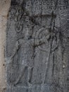 Detail of Stone Carving of Warrior and Surrounding Script at Ruins of Philippi Greece