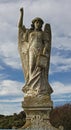 Detail of stone gravestone angel sculpture