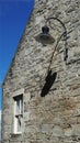 detail of a stone wall and a latern, Lerwick, Scotland