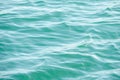 Detail of a sunlight reflecting in glittering sea. sparkler in water - background. sea water with sun glare and ripple. Powerful a Royalty Free Stock Photo
