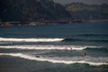 Surfer beach of Zarautz with people surfing in the waves 4. Royalty Free Stock Photo