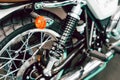 Detail of the suspension on the rear wheel of a custom motorbike Royalty Free Stock Photo