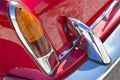 Detail of a tail light of a vintage italian red sport car Royalty Free Stock Photo