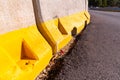 Detail of temporary concrete barricade walls on a newly paved road