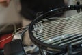 Detail of tennis racket in the stringing machine Royalty Free Stock Photo