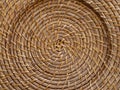 Detail of the texture in the circular patterns of a woven placemat Royalty Free Stock Photo