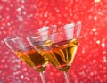 Detail of tilted glasses of cocktail on bar table