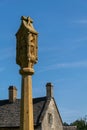 Detail of the top of the war memorial situated on the village green, Guiting Power, Gloucestershire, England Royalty Free Stock Photo