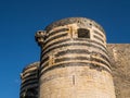 Detail of tower at Angers chateau, France, on a summer day