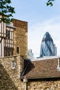 Detail of the Tower of London with the Gherkin in the back in London, UK Royalty Free Stock Photo