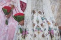 Detail of traditional floral dresses with flower offerings at the celebration `Fallas`, Valencia, Spain Royalty Free Stock Photo