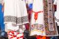 Detail of traditional folkloric costume of Romanian dancers perform a folk dance. Folklore of Romania Royalty Free Stock Photo
