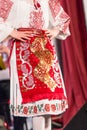 Detail of traditional folkloric costume of Romanian dancers perform a folk dance. Folklore of Romania Royalty Free Stock Photo